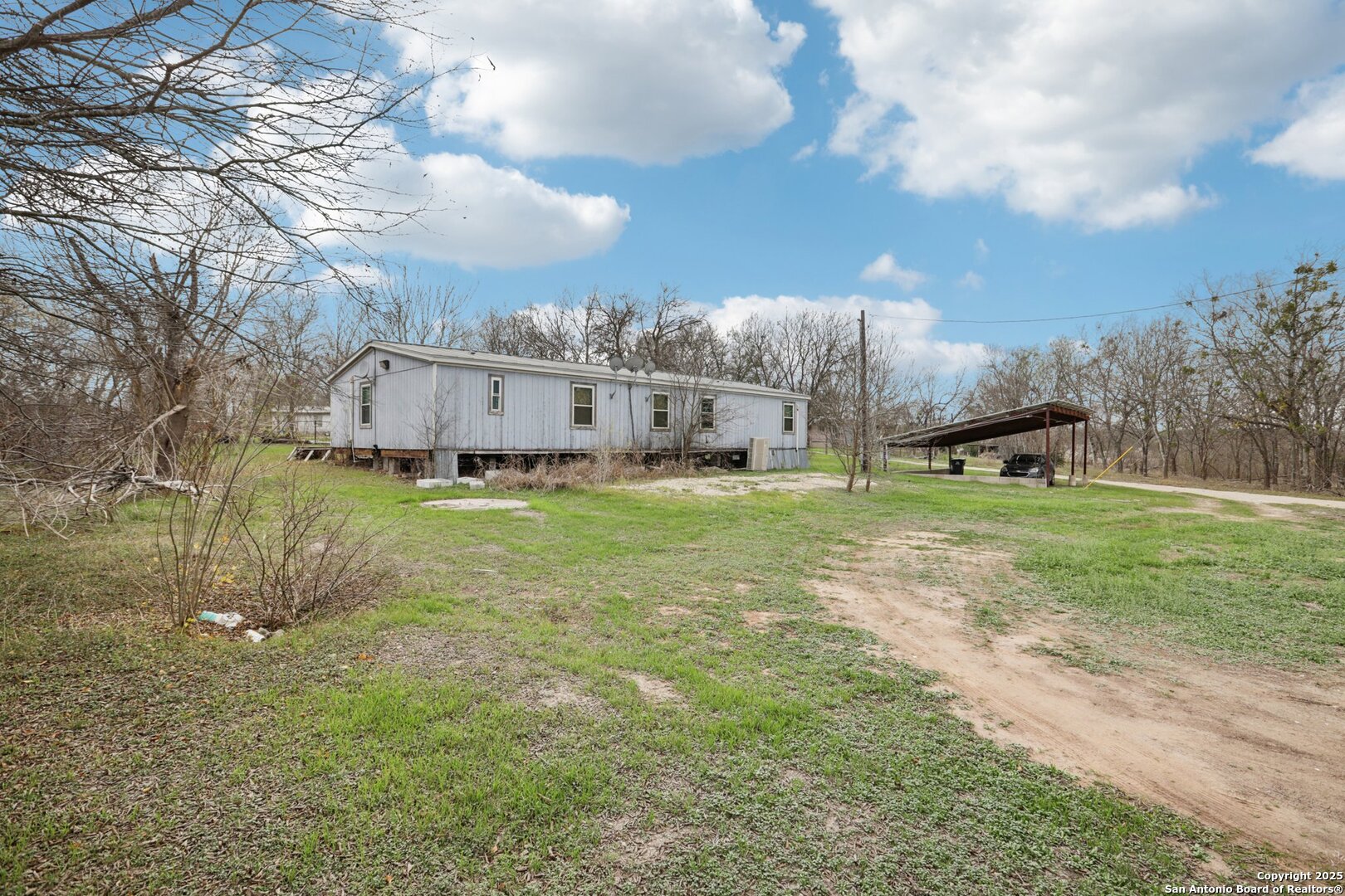 10701 Fm 1625 Austin, TX 78747 - Photo 7 of 43 a view of a house with a yard