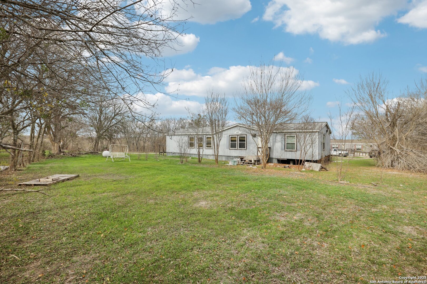 10701 Fm 1625 Austin, TX 78747 - Photo 9 of 43 a view of a house with a yard