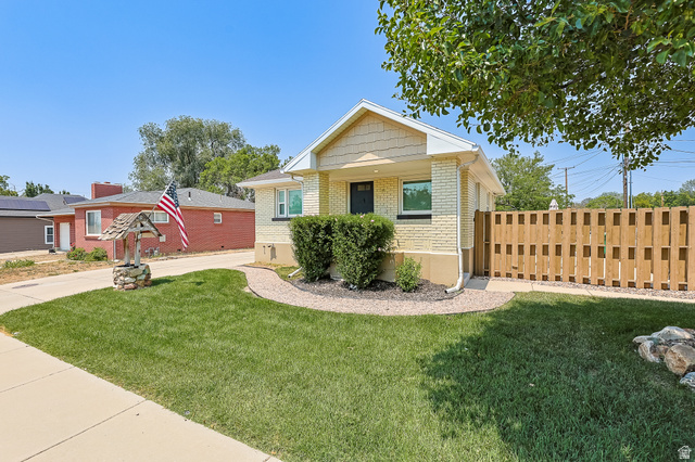 59 East 8680th Street South Sandy, UT 84070 - Photo 32 of 33 Brick exterior with shingle and clapboard accents