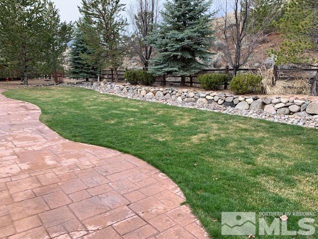 8380 Cinnamon Ridge Lane Reno, NV 89523 - Photo 15 of 17 a view of a backyard with plants