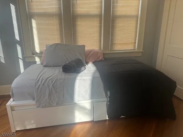 a kitchen with granite countertop a stove and cabinets