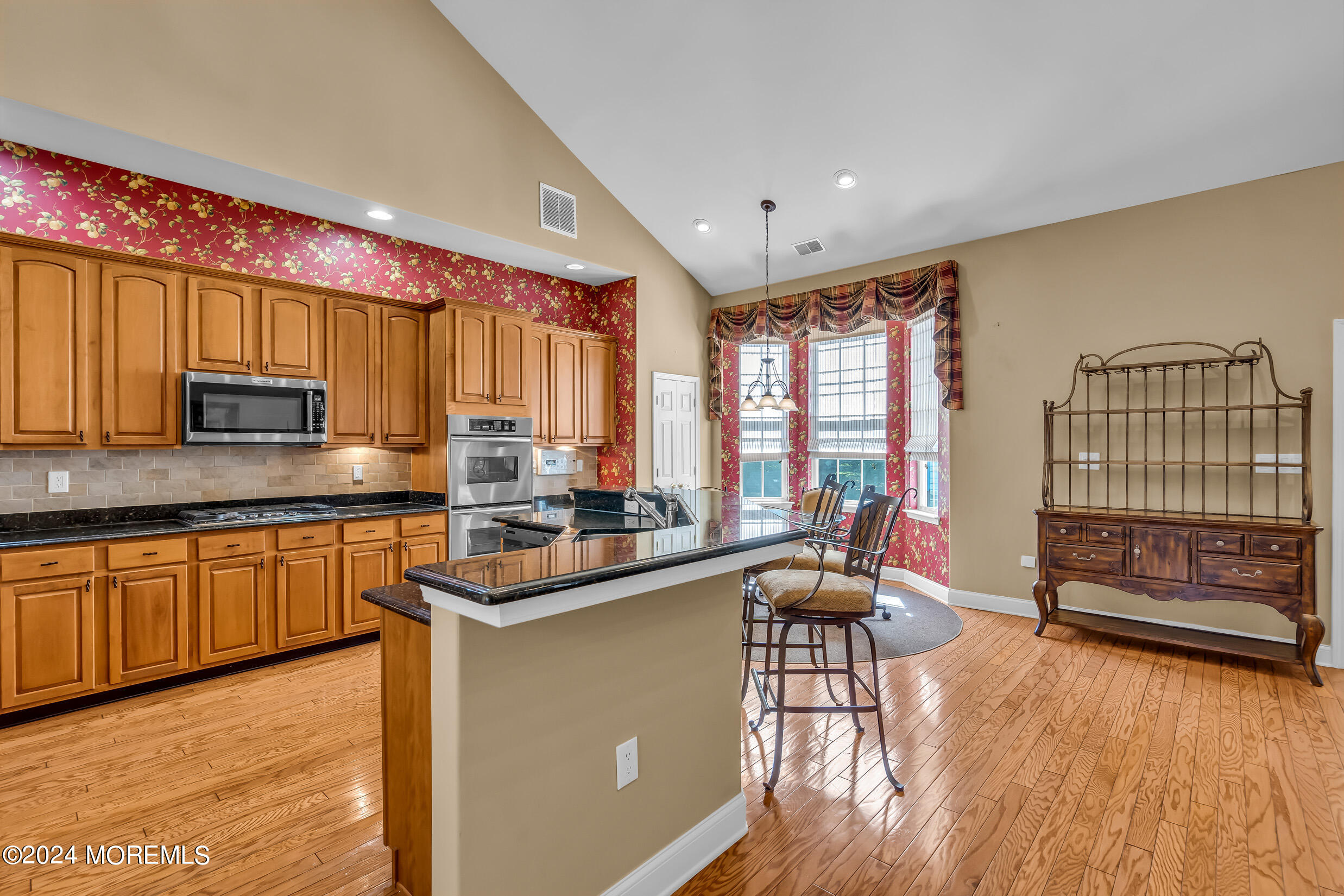 14 Headwaters Place Barnegat, NJ 08005 - Photo 21 of 68 a kitchen with stainless steel appliances granite countertop sink stove top oven and cabinets