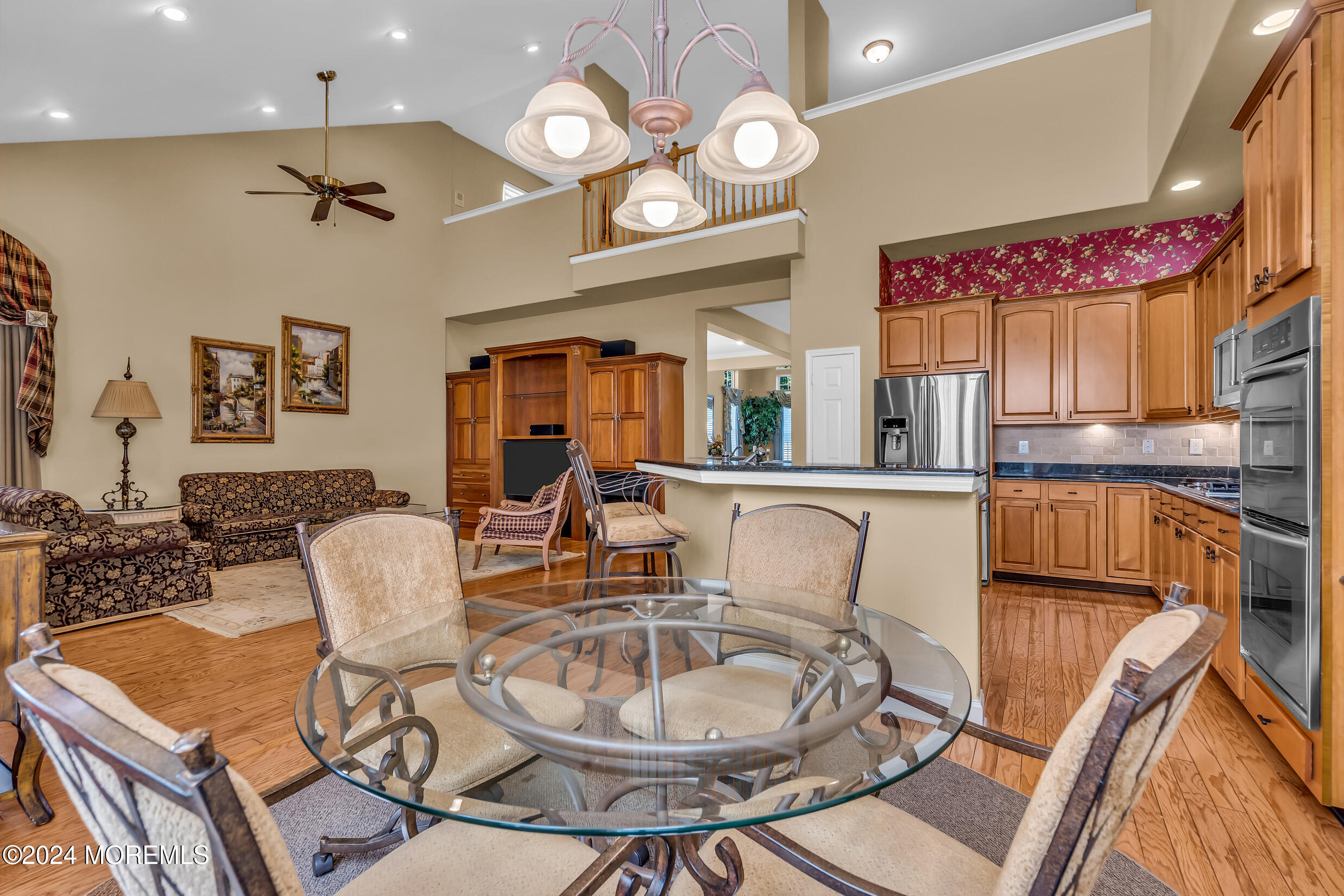 14 Headwaters Place Barnegat, NJ 08005 - Photo 23 of 68 a dining room with furniture a rug and wooden floor