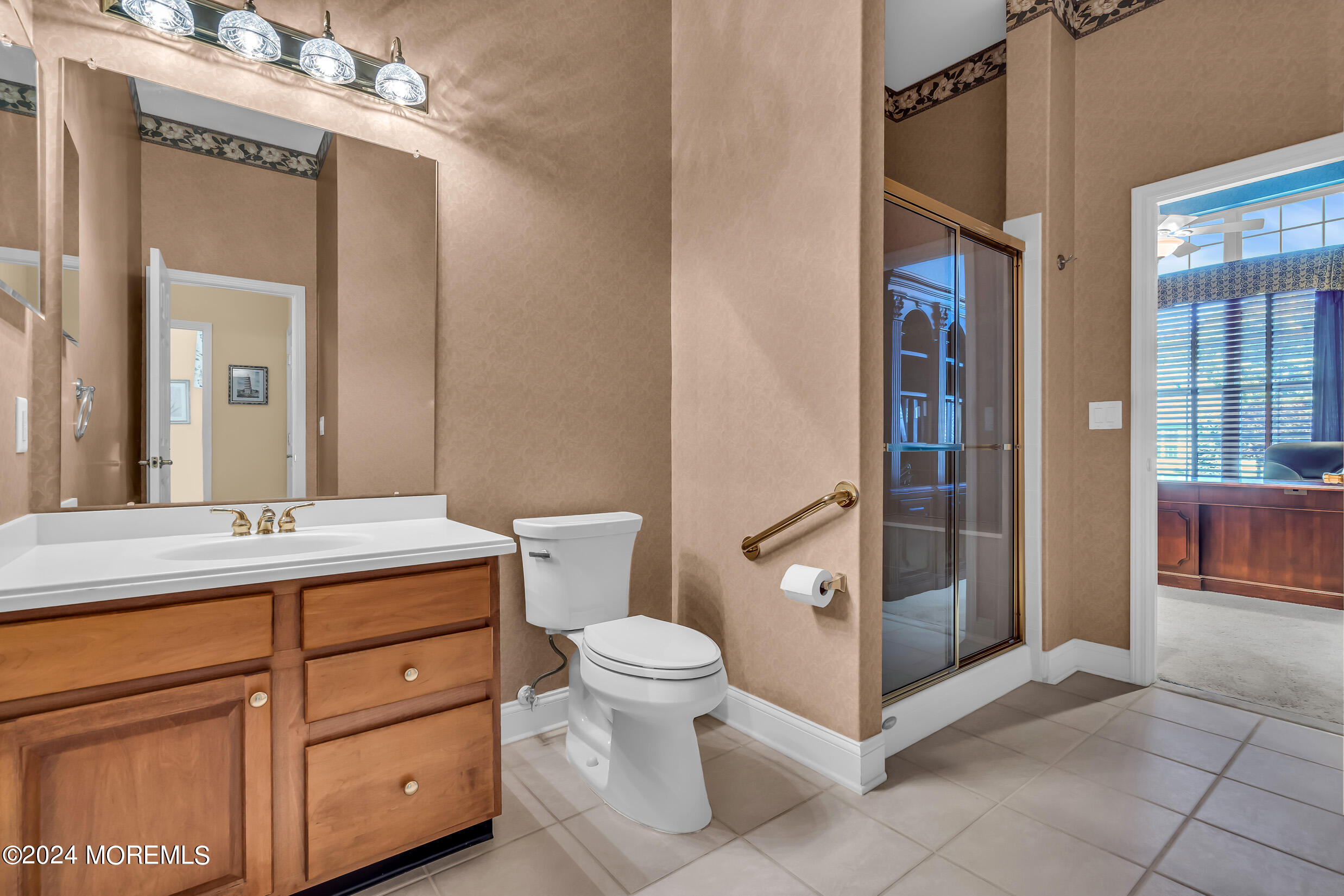 14 Headwaters Place Barnegat, NJ 08005 - Photo 34 of 68 a spacious bathroom with a granite countertop sink a toilet and a mirror