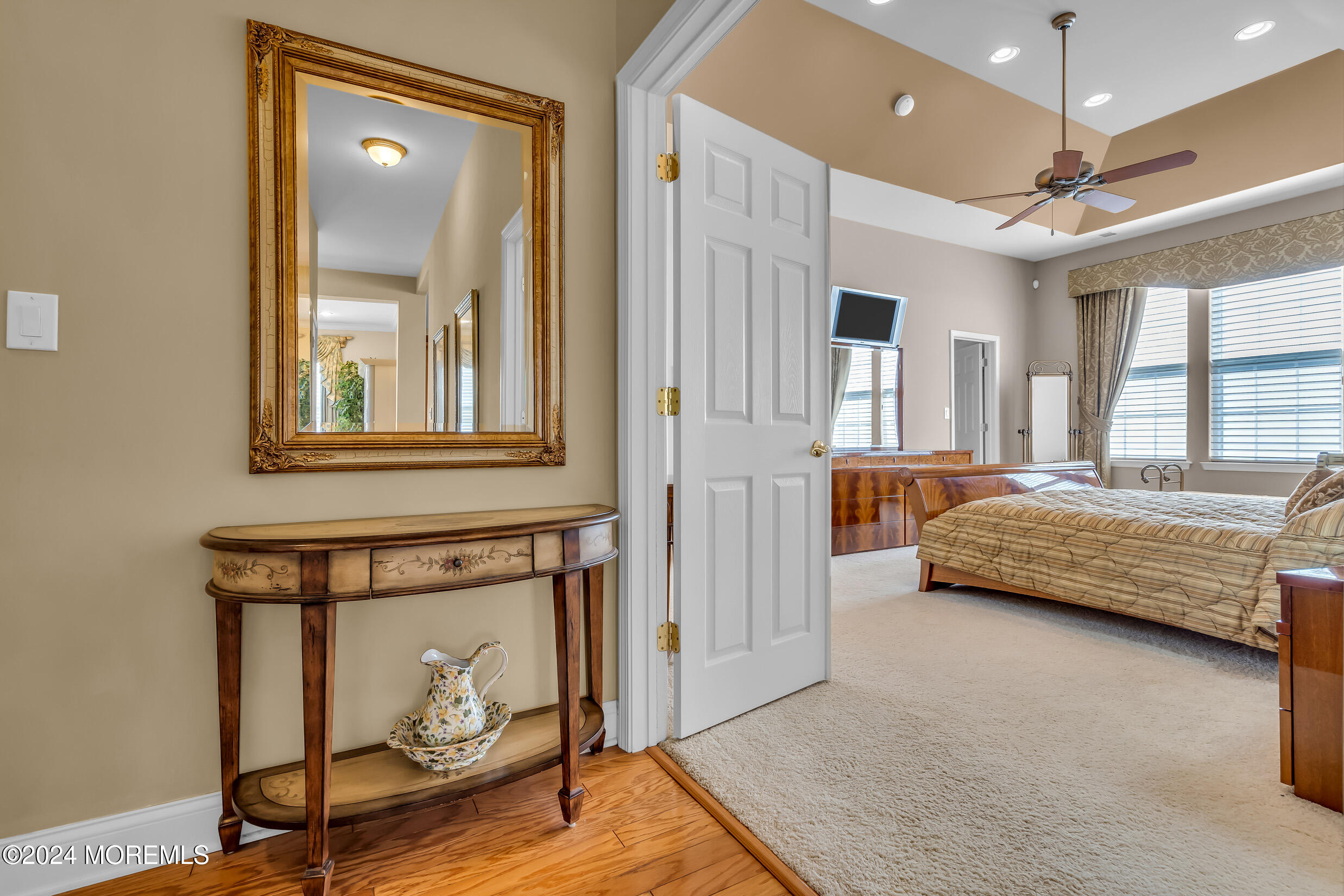 14 Headwaters Place Barnegat, NJ 08005 - Photo 38 of 68 a bedroom with a bed and a mirror