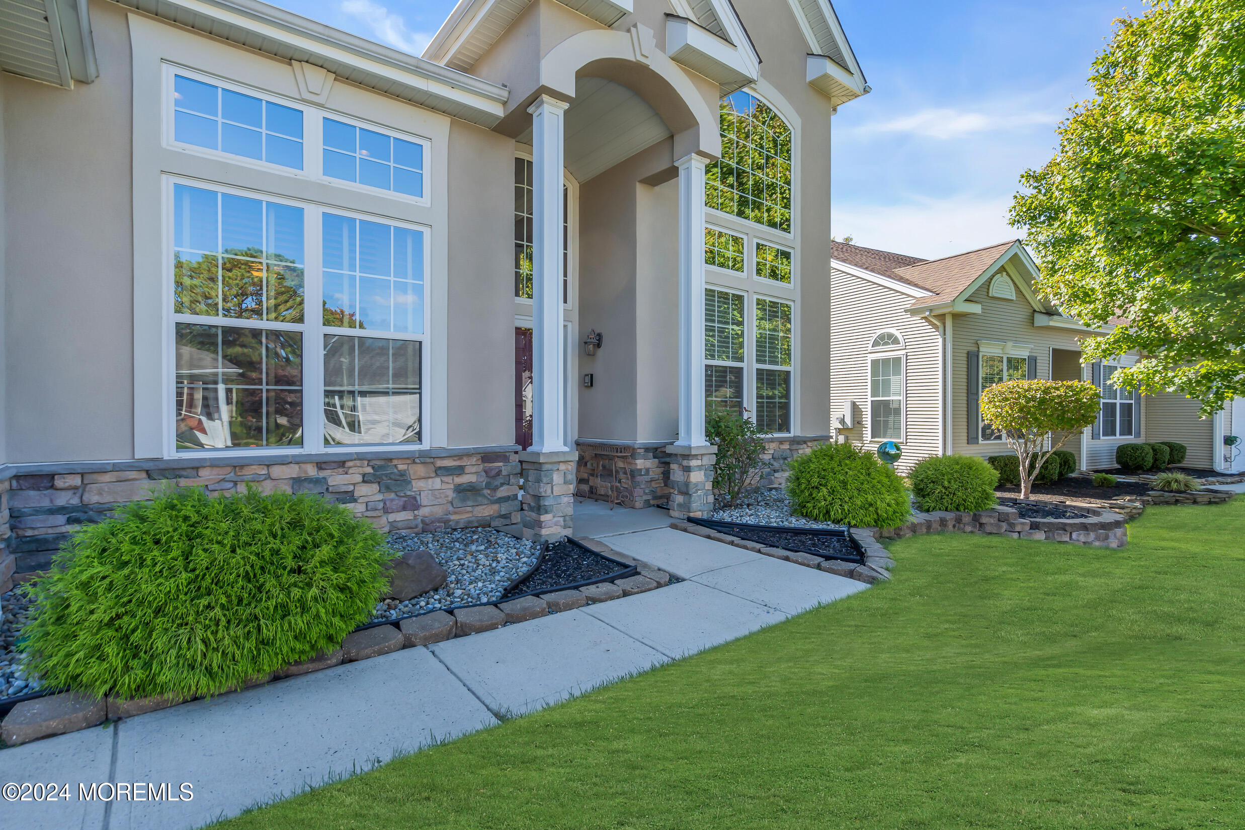 14 Headwaters Place Barnegat, NJ 08005 - Photo 4 of 68 a front view of a house with garden