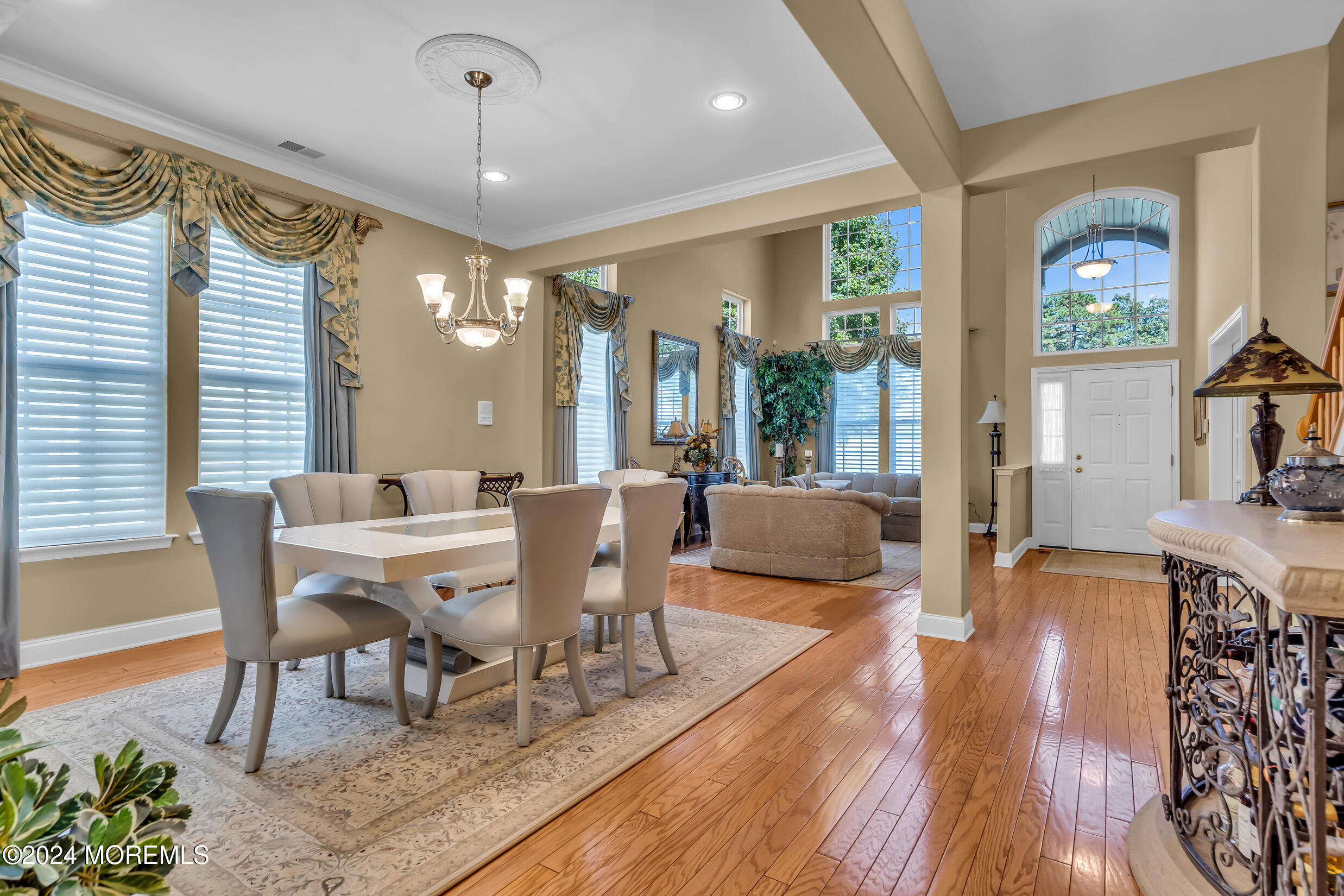 14 Headwaters Place Barnegat, NJ 08005 - Photo 41 of 68 a view of a dining room with furniture a chandelier and wooden floor