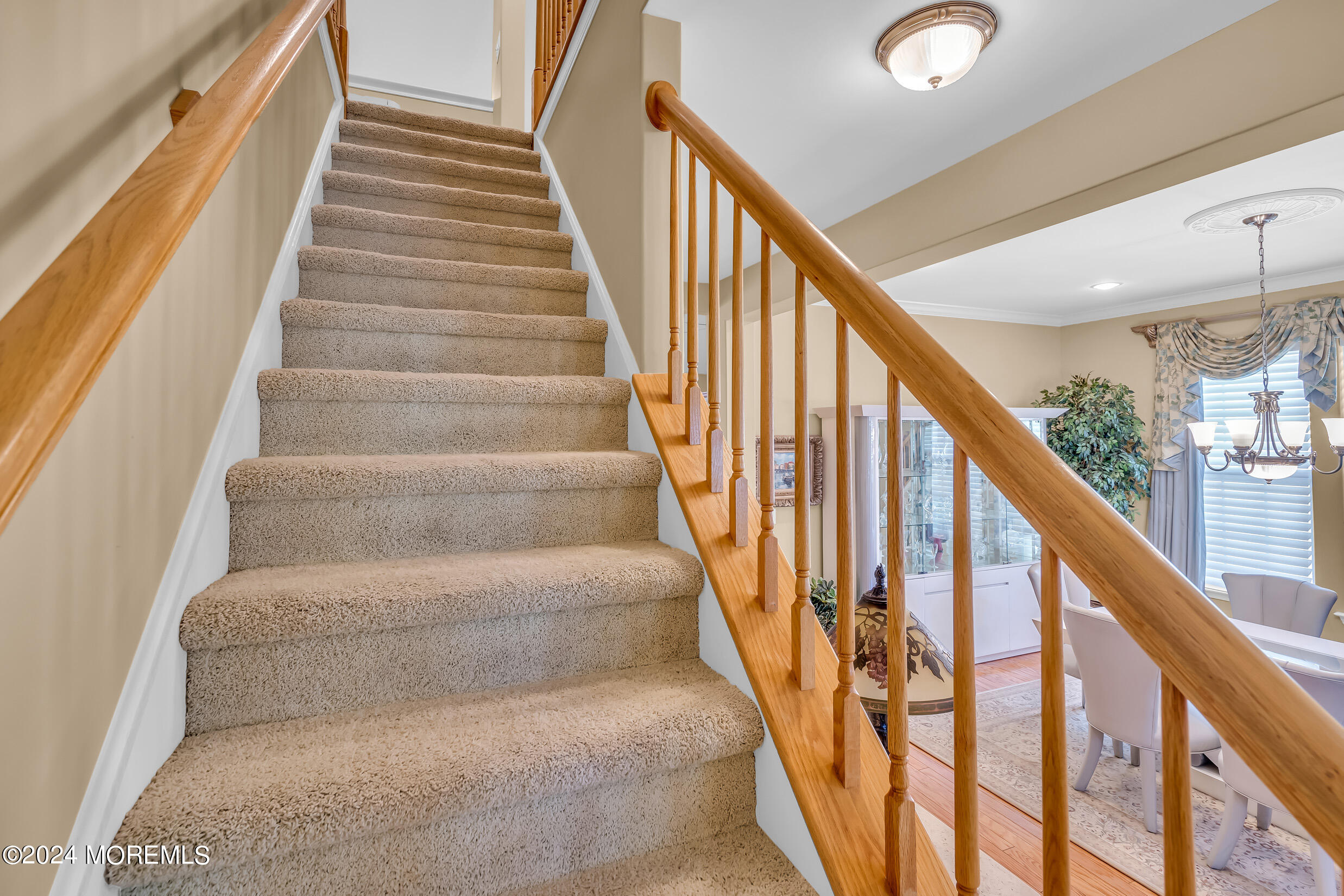14 Headwaters Place Barnegat, NJ 08005 - Photo 47 of 68 a view of staircase with lots of frames on wall