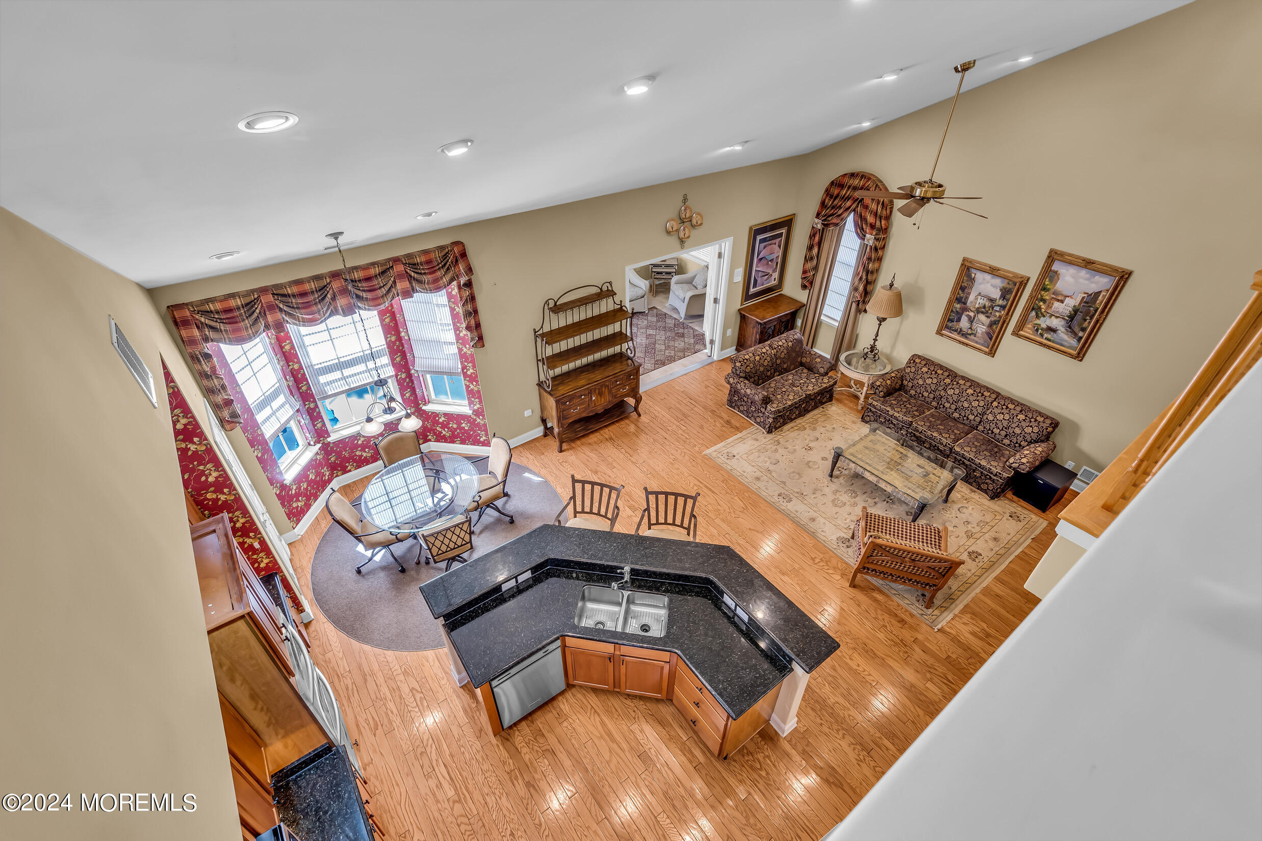 14 Headwaters Place Barnegat, NJ 08005 - Photo 48 of 68 a living room with furniture and a floor to ceiling window