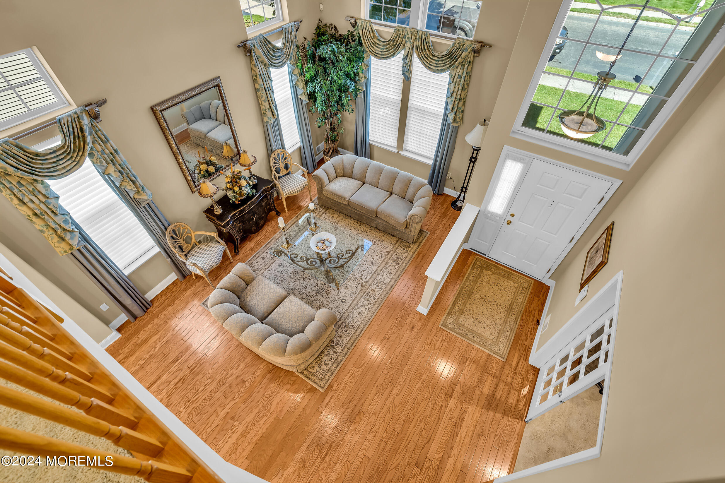14 Headwaters Place Barnegat, NJ 08005 - Photo 49 of 68 a living room with furniture and a floor to ceiling window