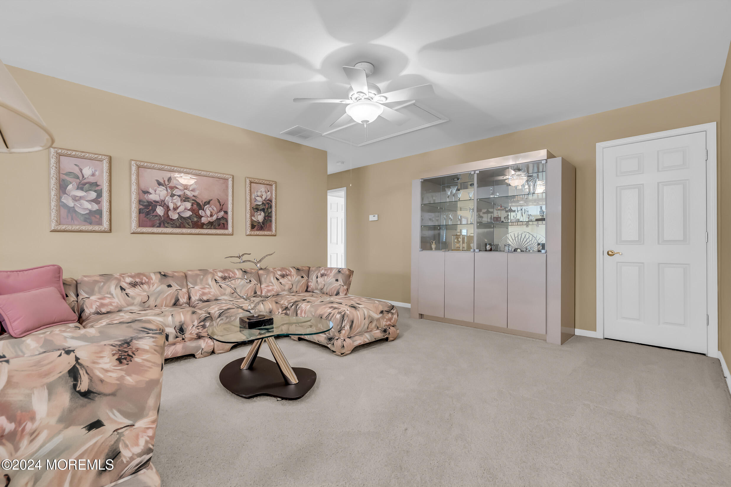 14 Headwaters Place Barnegat, NJ 08005 - Photo 52 of 68 a living room with furniture and a chandelier