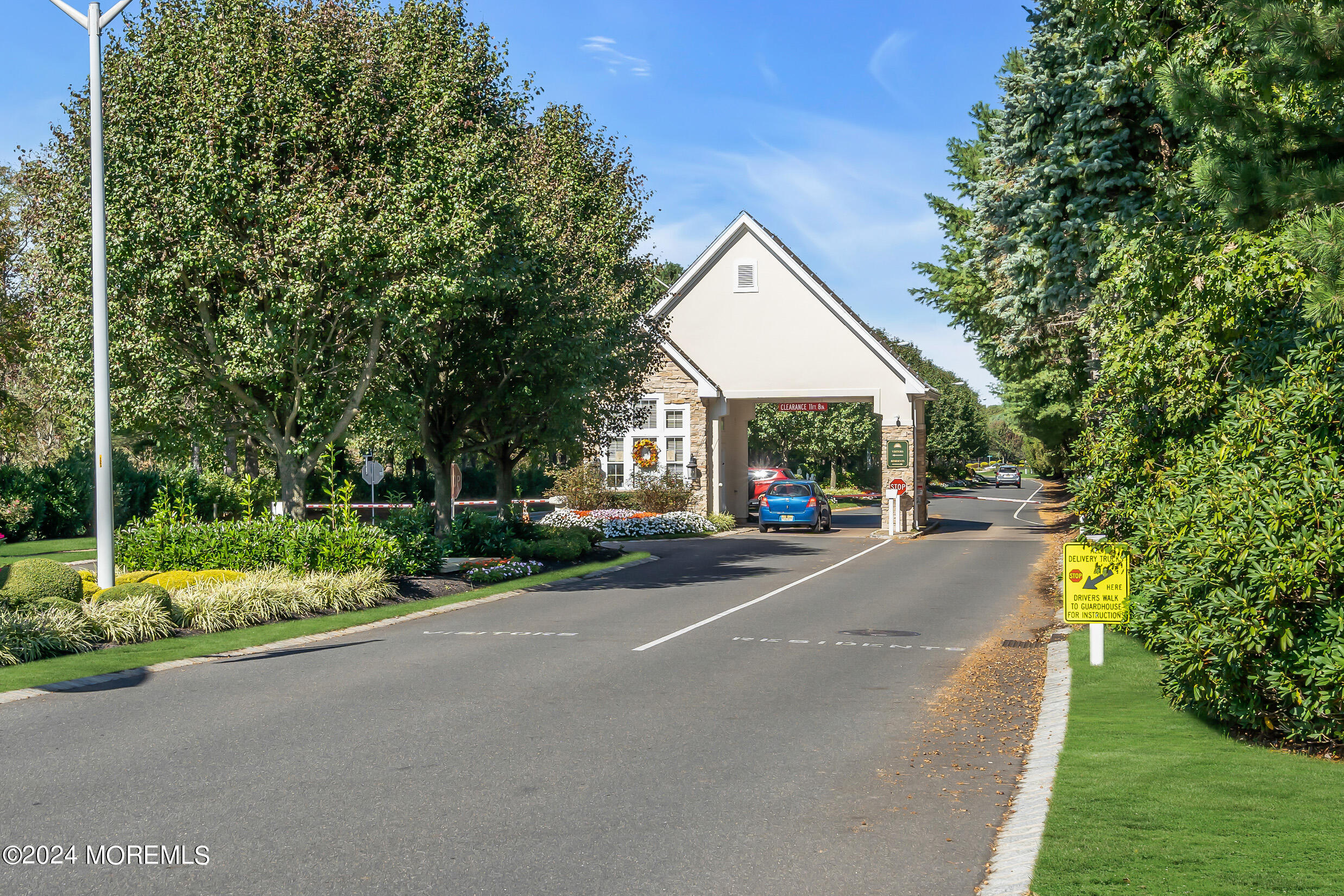 14 Headwaters Place Barnegat, NJ 08005 - Photo 63 of 68 a front view of a house with a yard and table and chairs