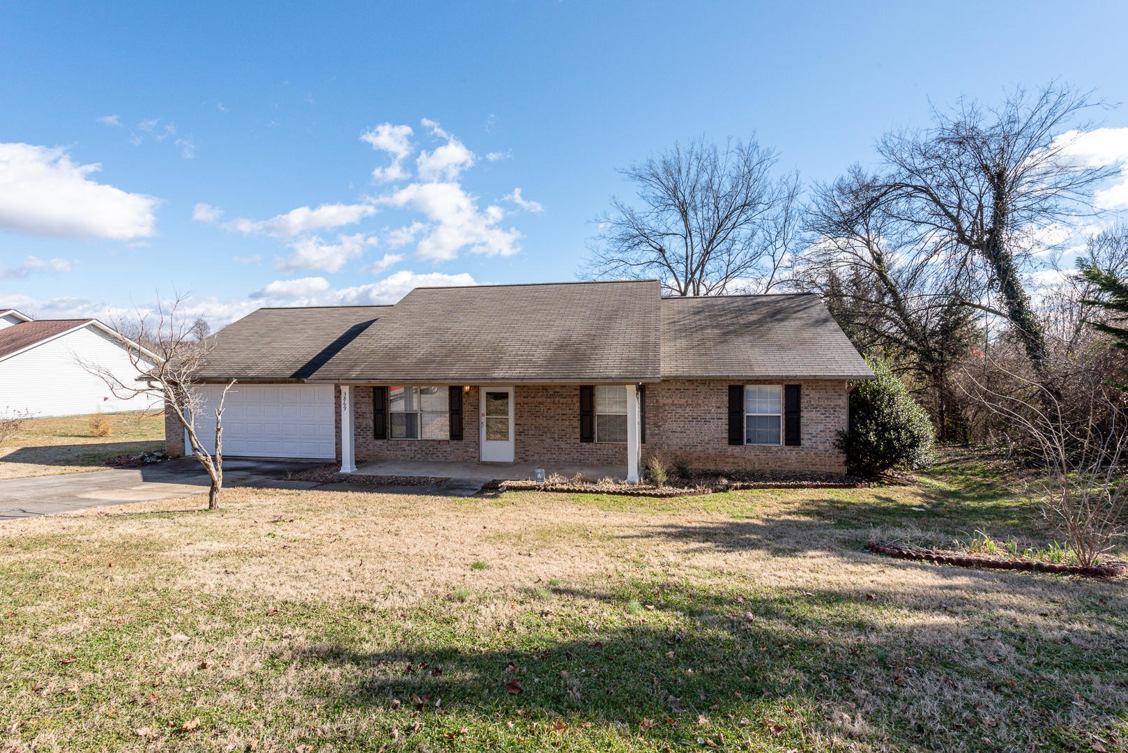 3869 Big Springs Ridge Road Friendsville, TN 37737 - Photo 2 of 21 a front view of a house with a yard