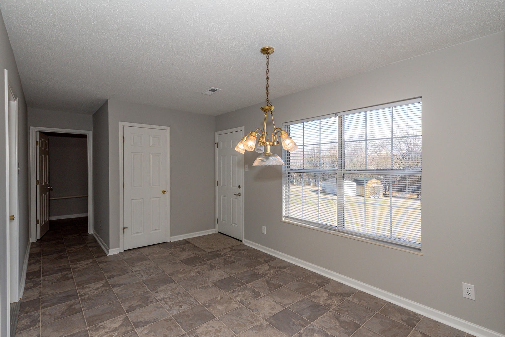 3869 Big Springs Ridge Road Friendsville, TN 37737 - Photo 10 of 21 a view of an empty room with a window