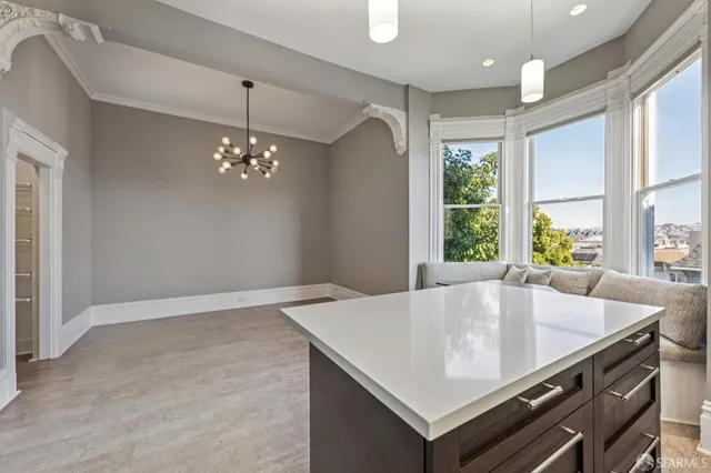 a dining table with a large window
