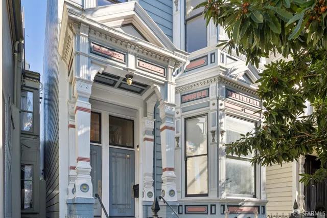 a view of a building with a street