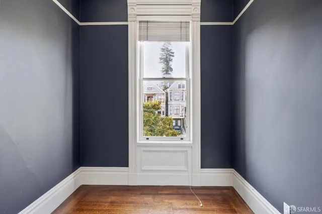 a view of an empty room and window