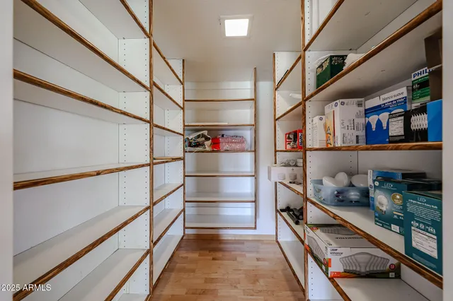 a view of a living room and a livingroom with furniture