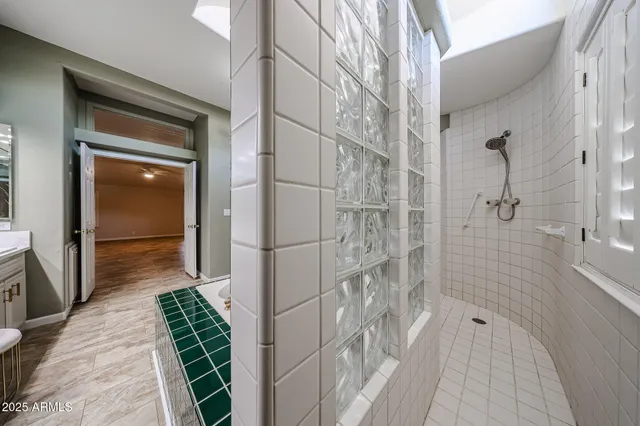 a view of a street with houses on the road