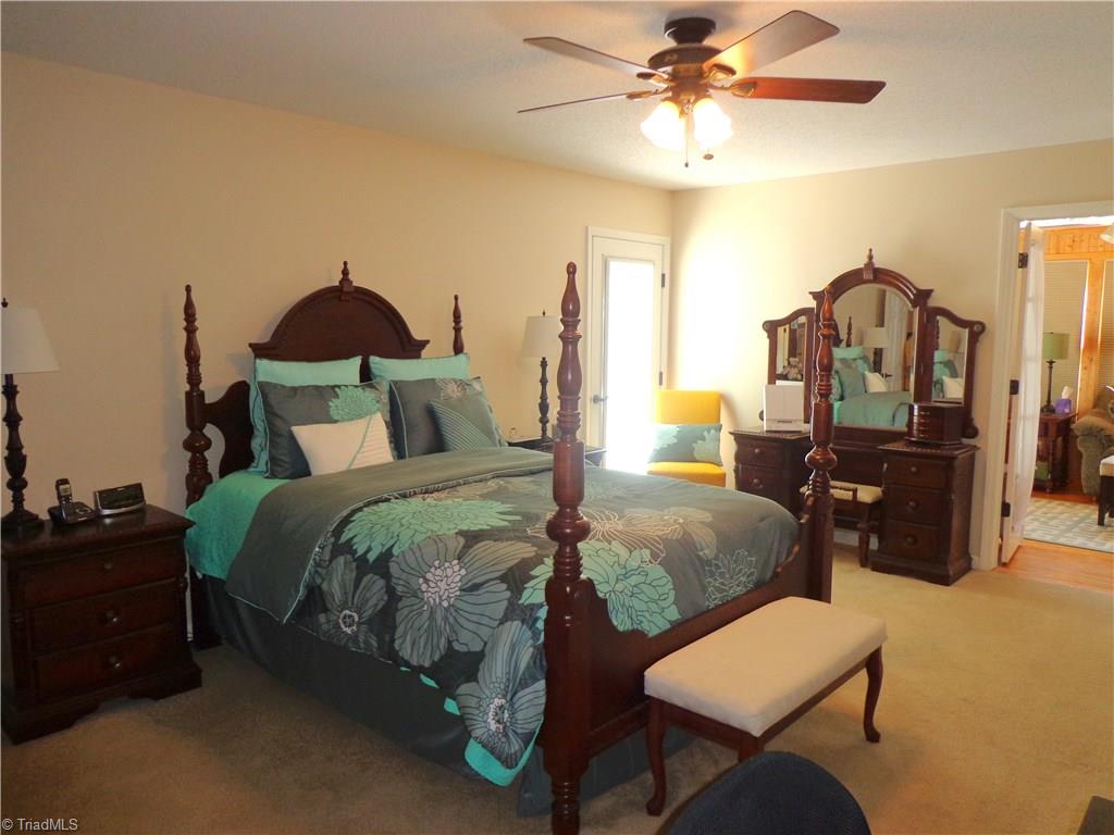 9009 Racine Road Pleasant Garden, NC 27313 - Photo 11 of 21 Large Master Suite w/Updated Paint. His and Her Closets