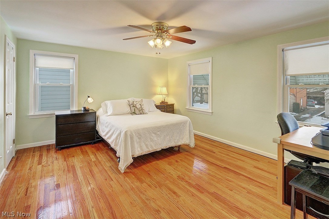 4457 Groveland Road University Heights, OH 44118 - Photo 17 of 24 The main bedroom has more of the warm wood floors, neutral paint color, younger windows.