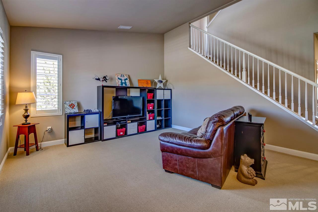 1990 Back Nine Trail Reno, NV 89523 - Photo 11 of 25 a living room with furniture and a flat screen tv