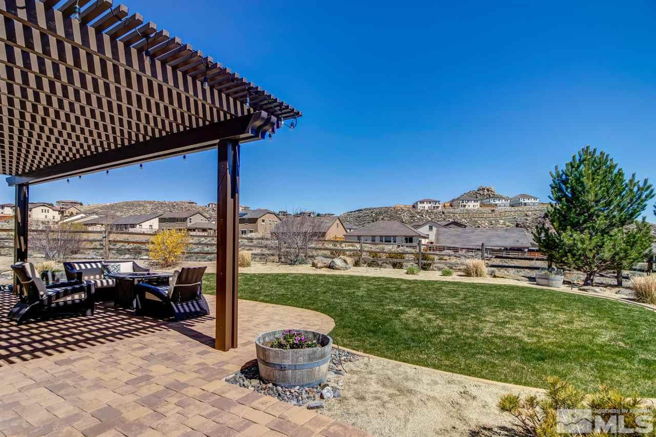 1990 Back Nine Trail Reno, NV 89523 - Photo 20 of 25 a view of a patio with a table chairs and a yard