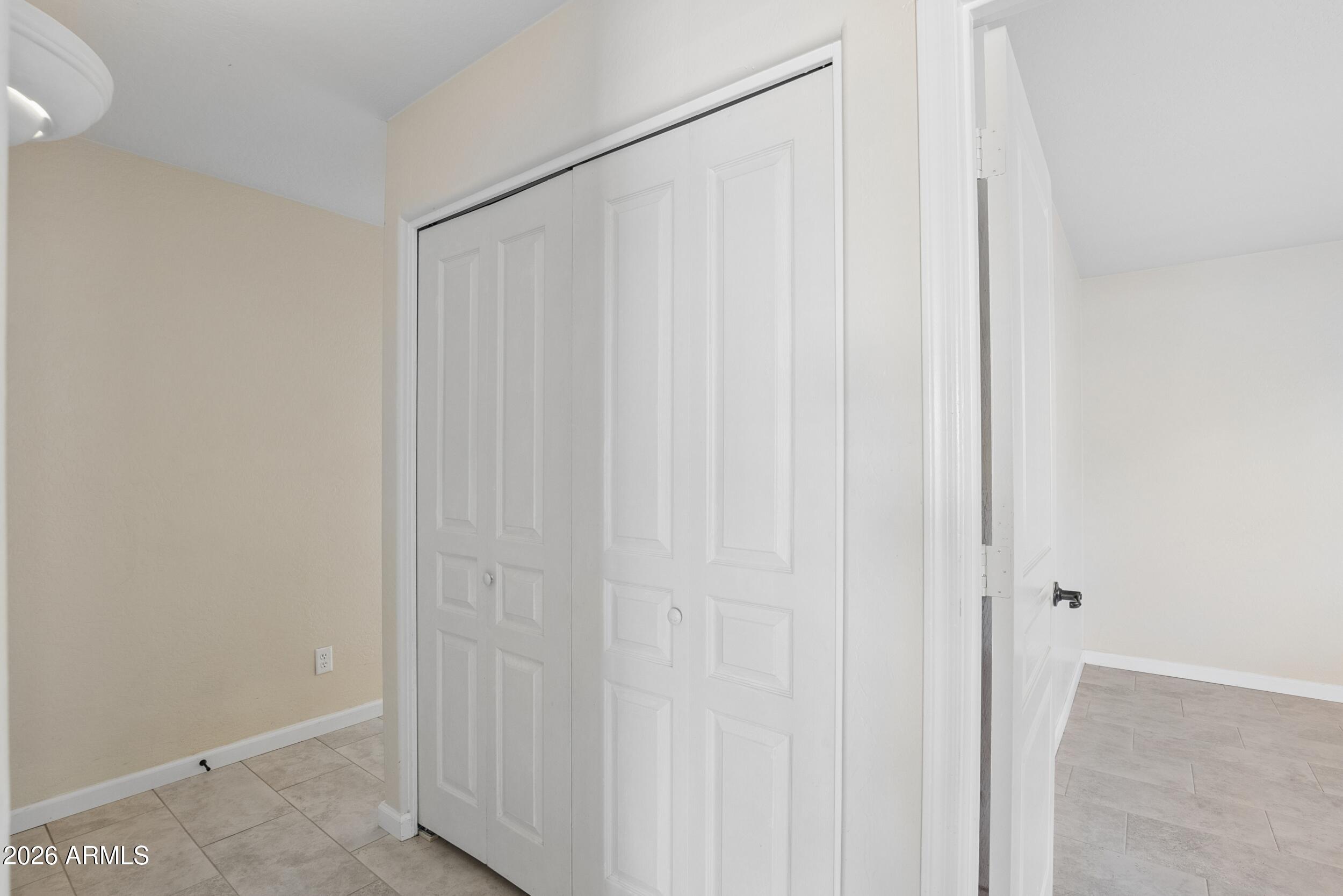 24025 West Pecan Road Buckeye, AZ 85326 - Photo 31 of 42 Hall with Laundry Closet