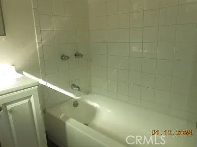 a bathroom with a bathtub