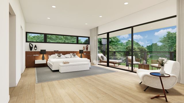 a spacious bedroom with a bed and large window