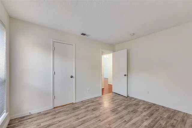 a bathroom with a shower sink and mirror