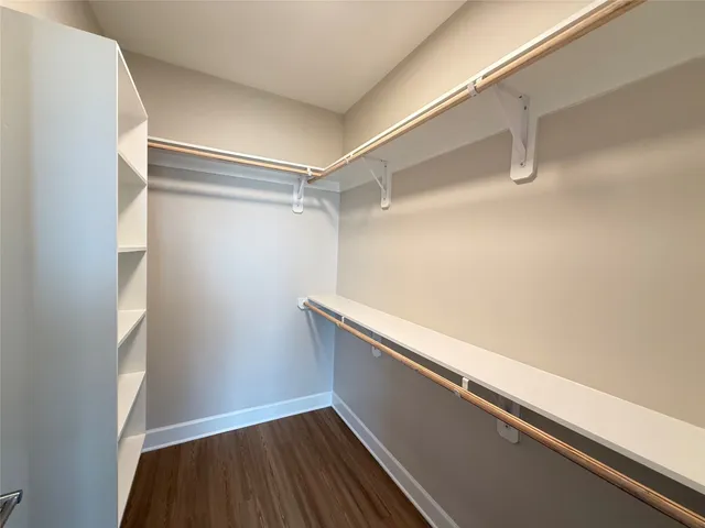 a bathroom with a bathtub shower sink and toilet