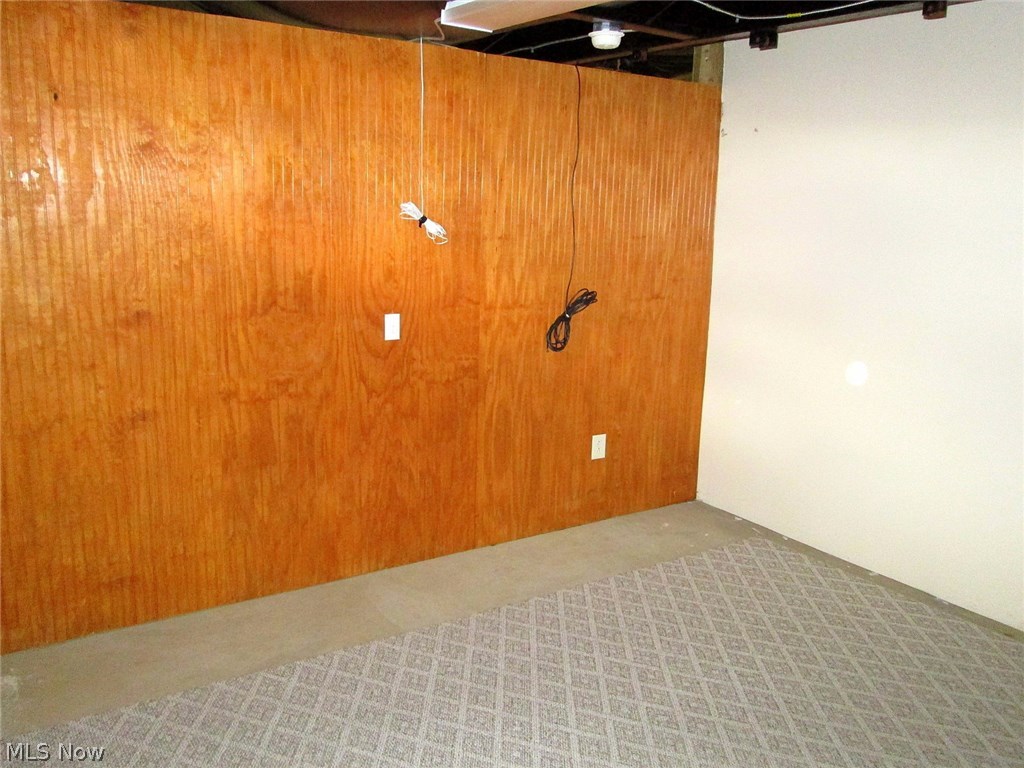 11248 Stratton Road West Salem, OH 44287 - Photo 8 of 12 A room in the basement that is already partially finished.