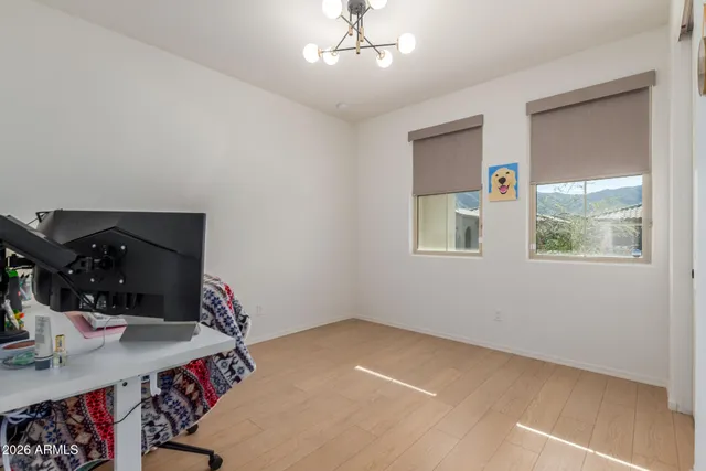 a view of a dinning table and chairs in patio