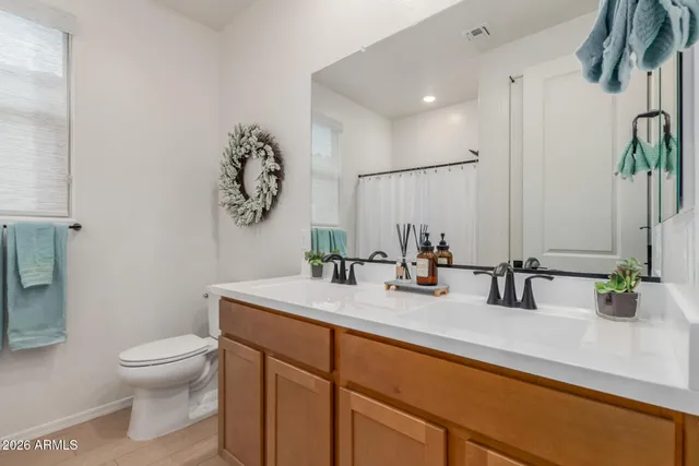 a view of a house with backyard and porch