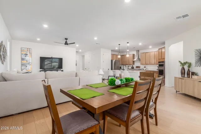 a view of a dining room with furniture and a livingroom