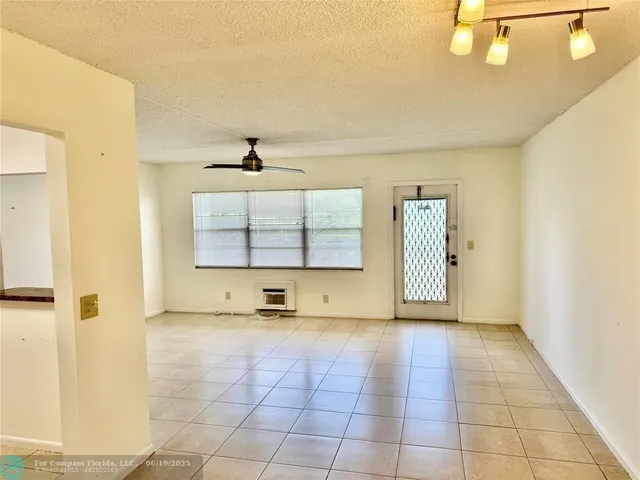 a view of kitchen with windows