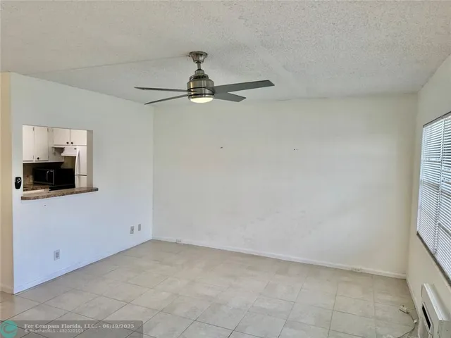 a view of a room with an empty space