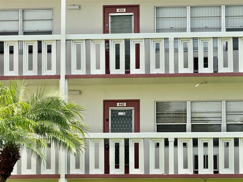 440 Fanshaw K, Unit 440 Boca Raton, FL 33434 - Photo 2 of 18 a view of a large building with a window