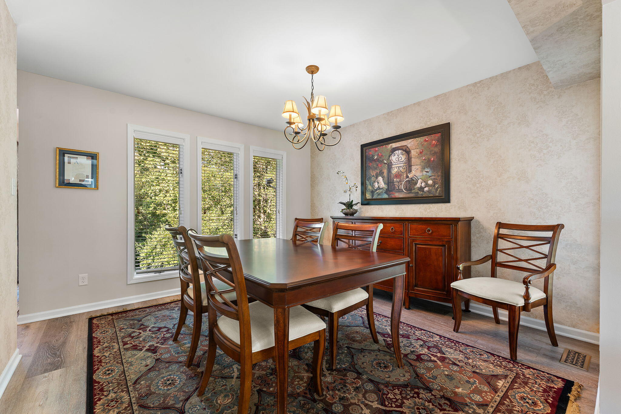 8748 Durbin Lane Crown Point, IN 46307 - Photo 11 of 47 a view of a dining room with furniture window and wooden floor