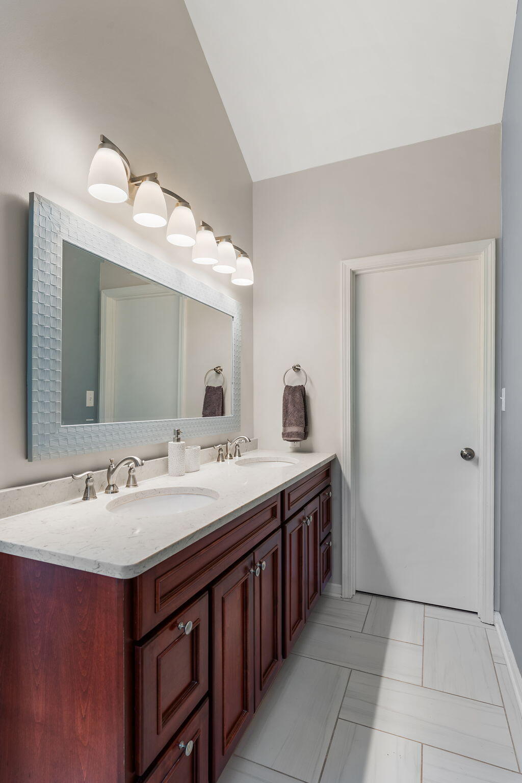 8748 Durbin Lane Crown Point, IN 46307 - Photo 25 of 47 a bathroom with a sink and a mirror