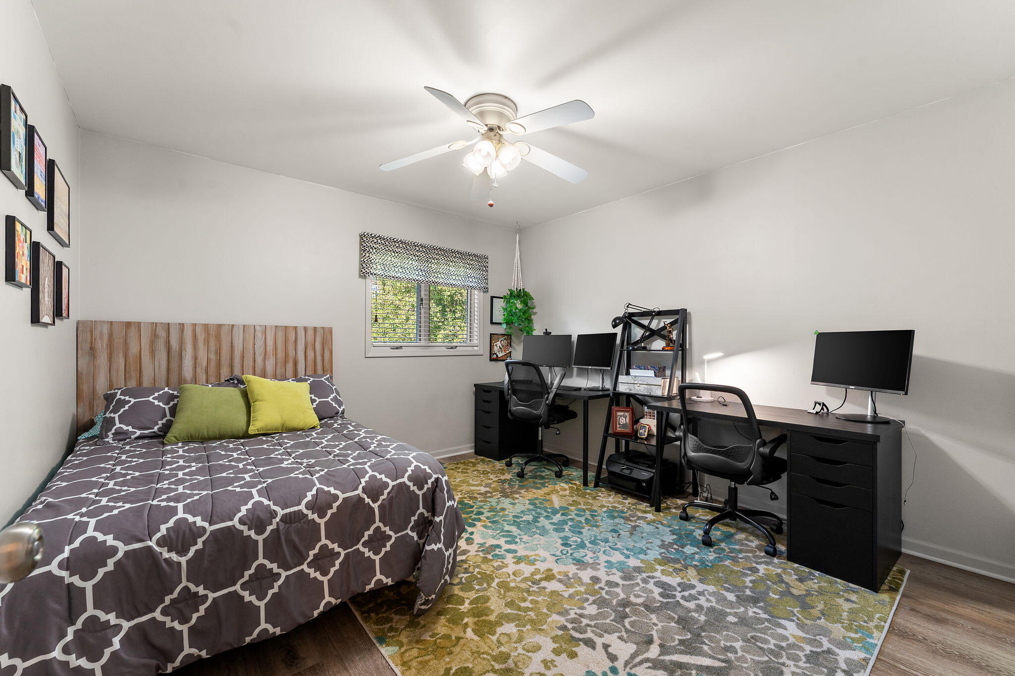 8748 Durbin Lane Crown Point, IN 46307 - Photo 29 of 47 a bedroom with a large bed and a chandelier