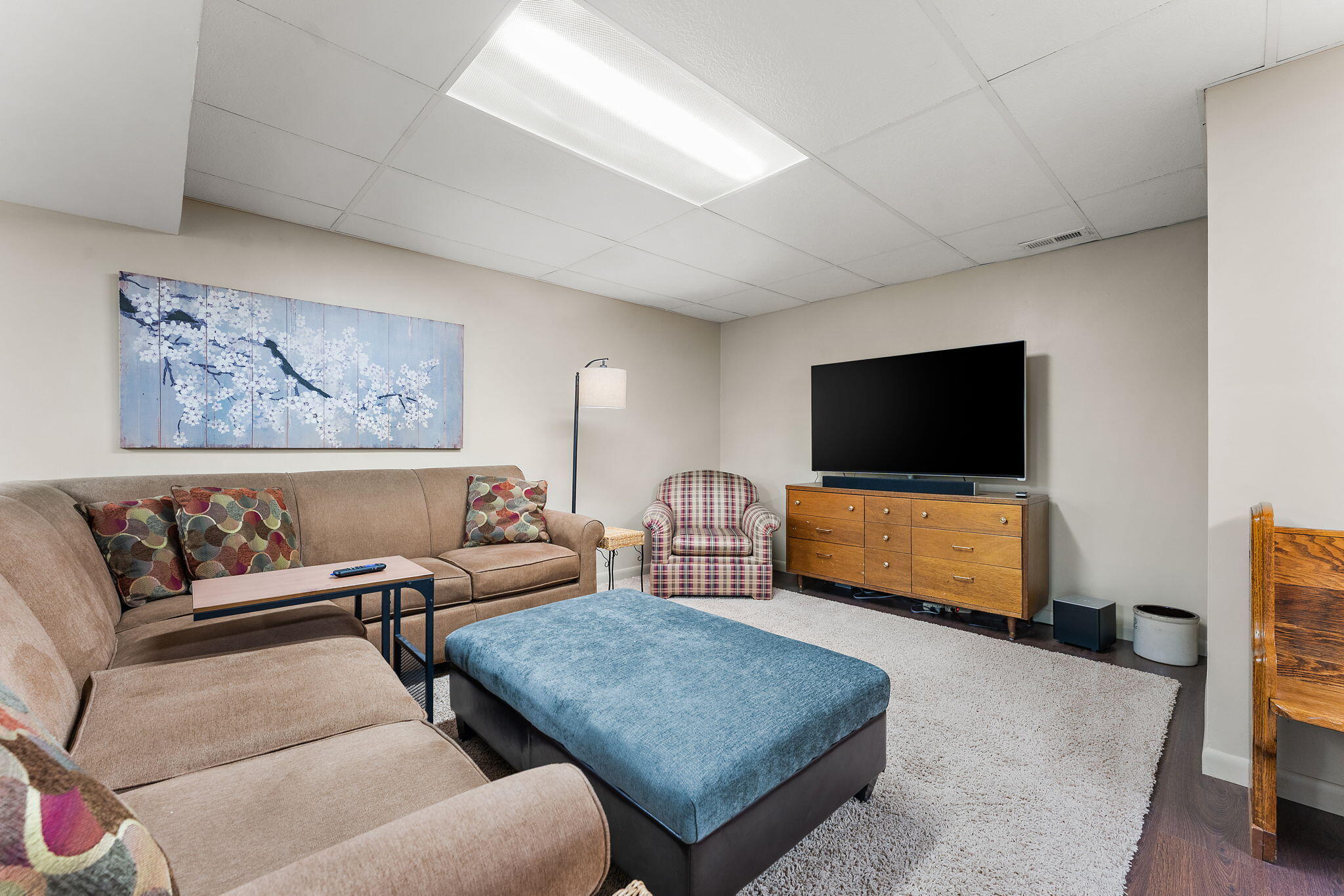 8748 Durbin Lane Crown Point, IN 46307 - Photo 31 of 47 a living room with furniture and a flat screen tv