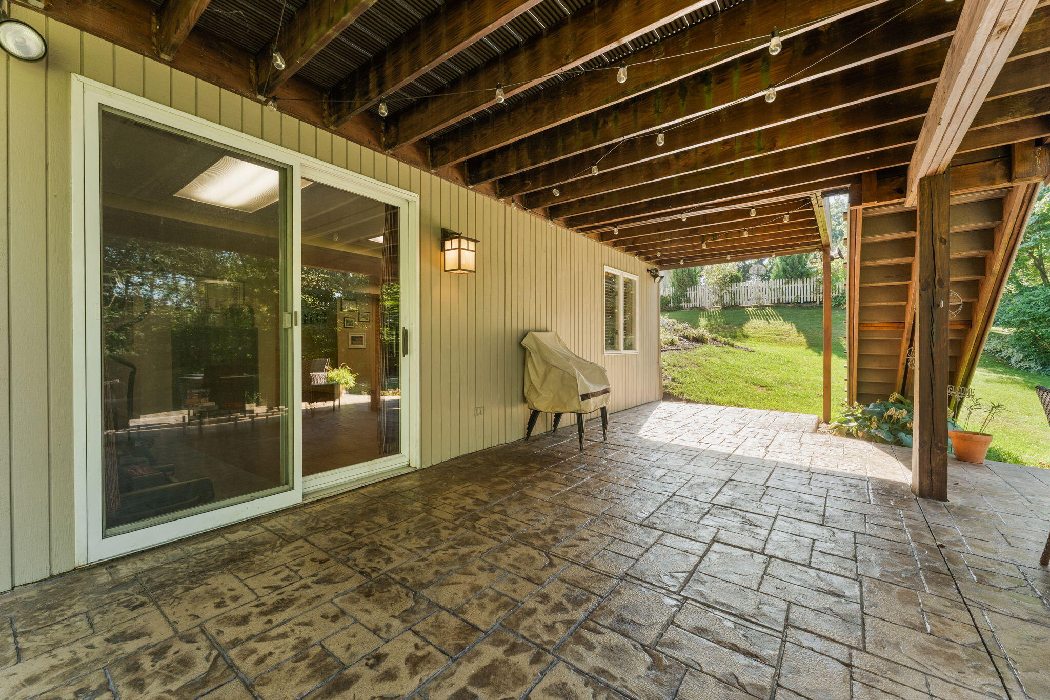 8748 Durbin Lane Crown Point, IN 46307 - Photo 38 of 47 a view of a porch with a table and chairs