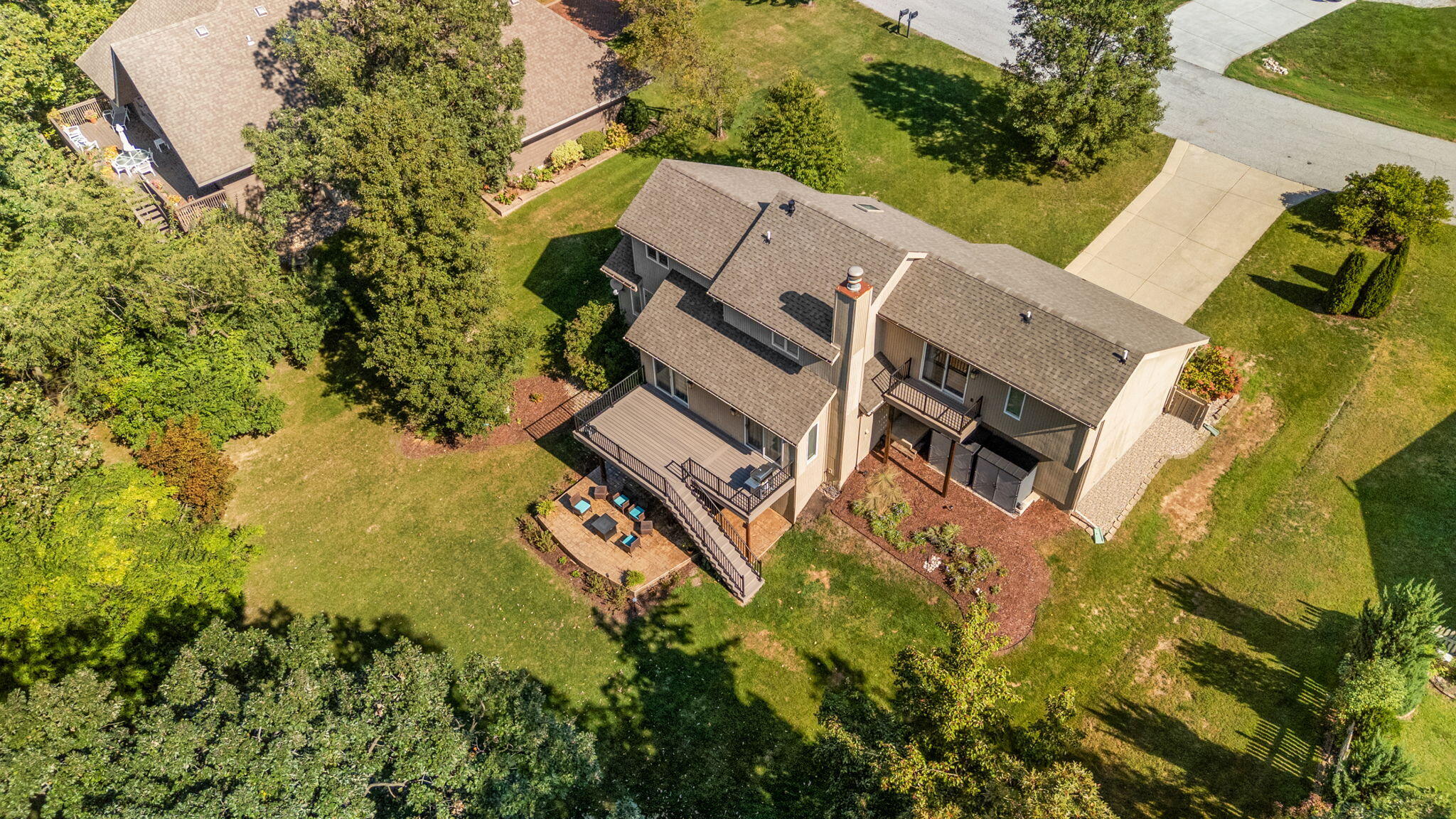 8748 Durbin Lane Crown Point, IN 46307 - Photo 4 of 47 an aerial view of residential house with outdoor space and trees all around