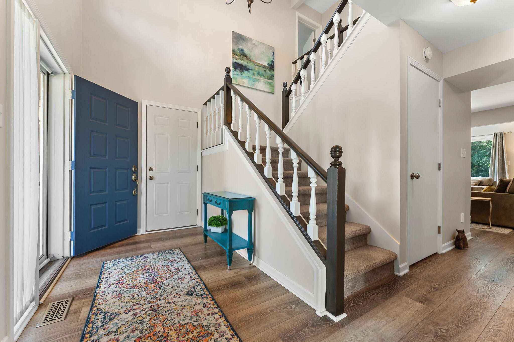 8748 Durbin Lane Crown Point, IN 46307 - Photo 6 of 47 a view of entryway with wooden floor and stairs
