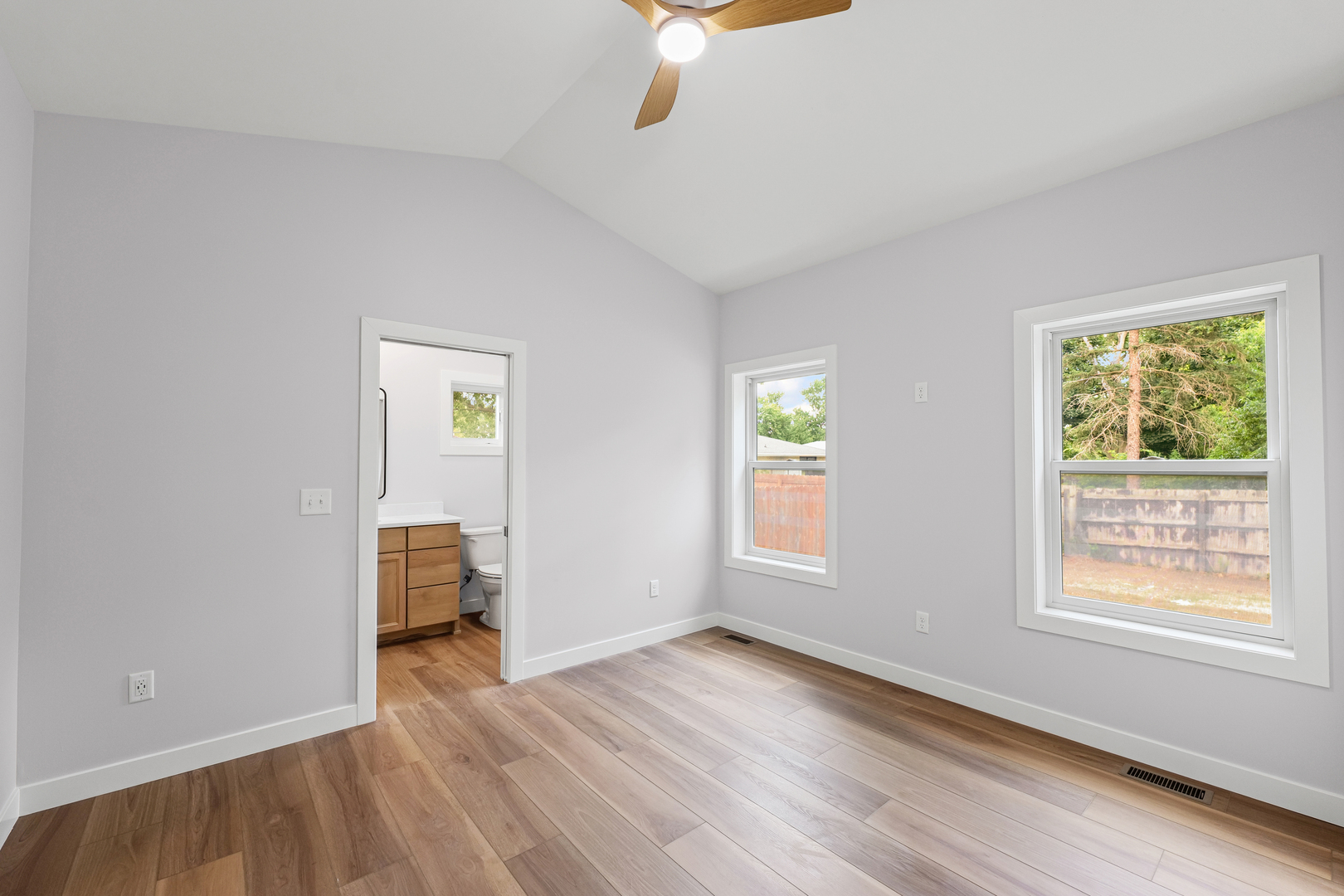403 East Larmon Street Tolono, IL 61880 - Photo 15 of 22 a view of room with window and wooden floor