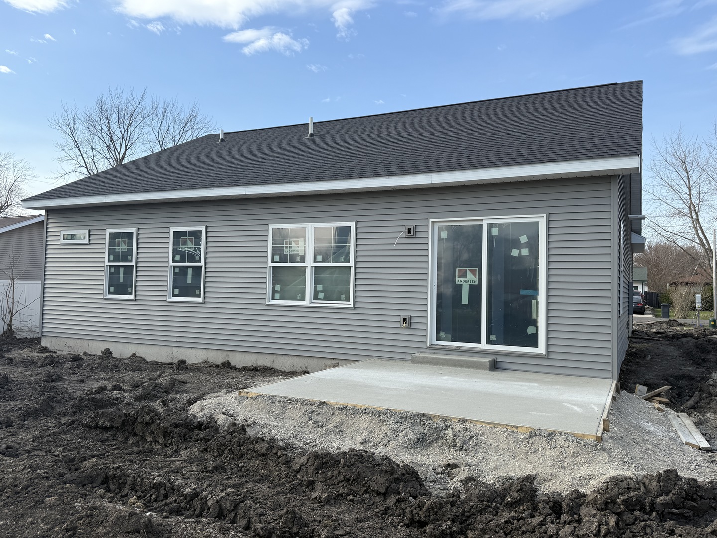403 East Larmon Street Tolono, IL 61880 - Photo 2 of 22 a front view of a house with a garden