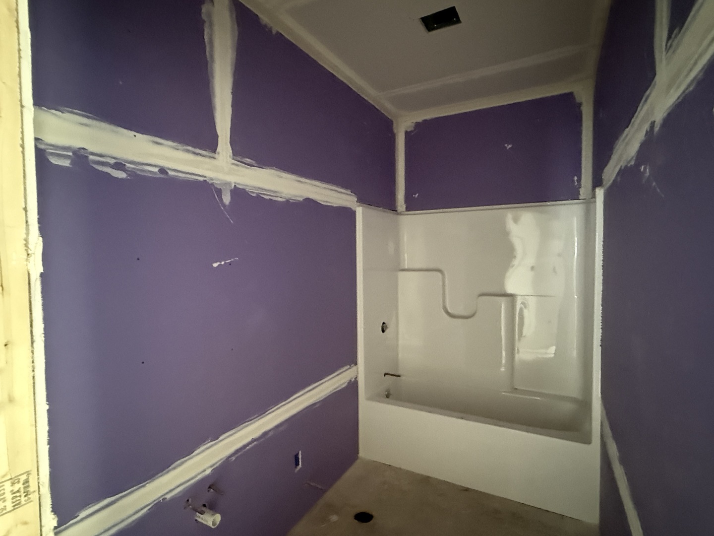 403 East Larmon Street Tolono, IL 61880 - Photo 21 of 22 a bathroom with a bathtub and shower