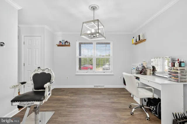 a room with a window and gym equipment